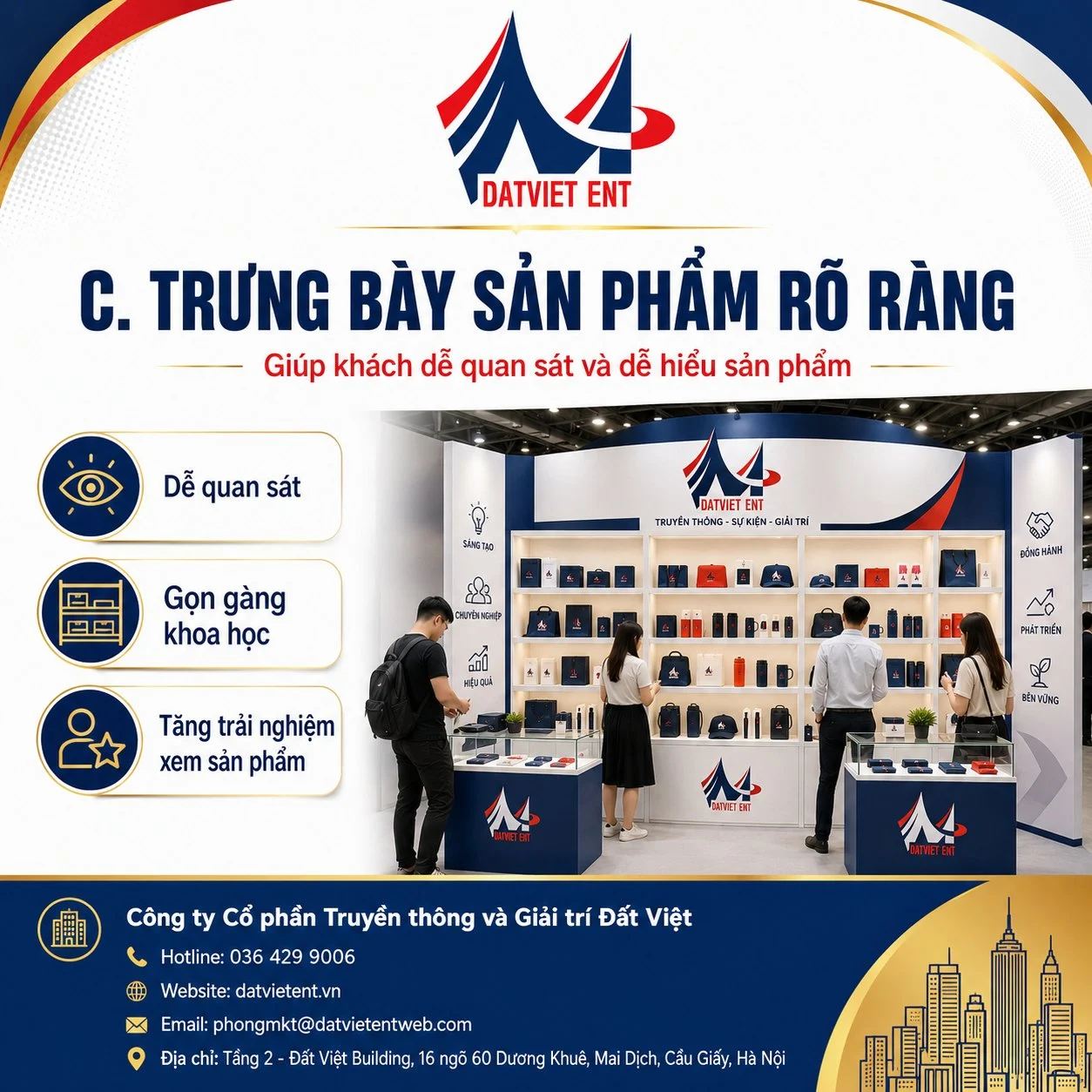 Khu trưng bày sản phẩm trên kệ trắng có đèn chiếu, khách tham quan đang xem hàng tại gian triển lãm